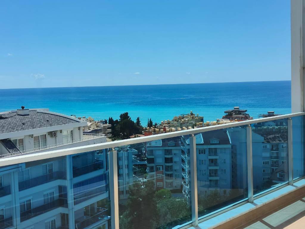 Möblierte Maisonette-Wohnung mit 3 Schlafzimmern und Meerblick zum Verkauf in Alanya - Tosmur